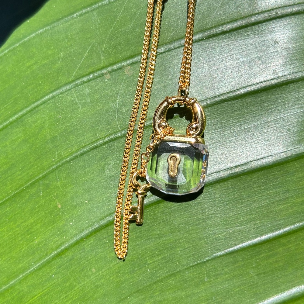 Retired Swarovski swan gold tone Crystal Memories Lock and Key Necklace